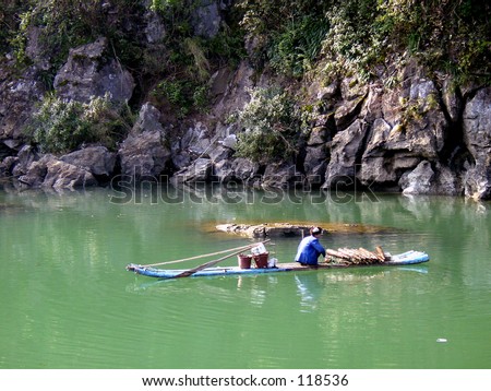 old man on small raft in China