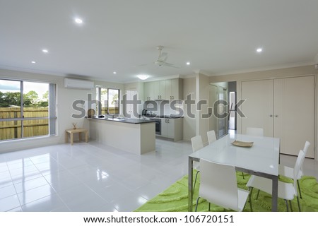 Modern kitchen and dining area in Australian townhouse