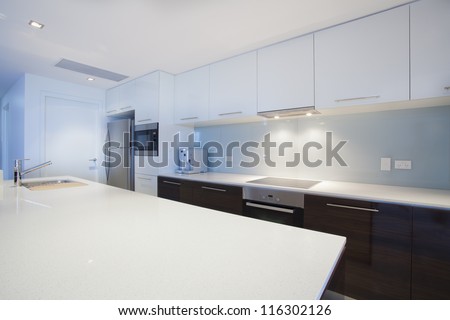 Modern new kitchen with stainless steel appliances Modern new kitchen with stainless steel appliances