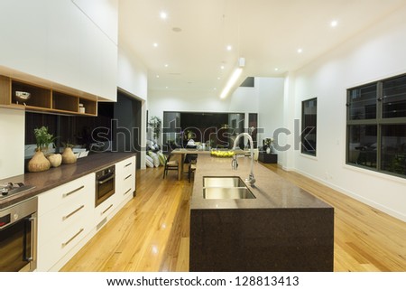 Kitchen And Living Area In Luxury Home