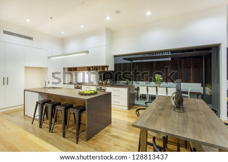 Kitchen And Entertainment Area In Luxury Home