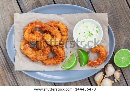 Coconut shrimp with garlic aioli and lime