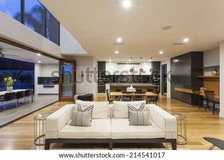 Big modern home with kitchen, living room and outdoor area
