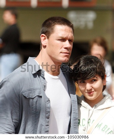 NEW ORLEANS-MAR. 19:Professional wrestler and actor John Cena jumps from a car during the filming of the movie \