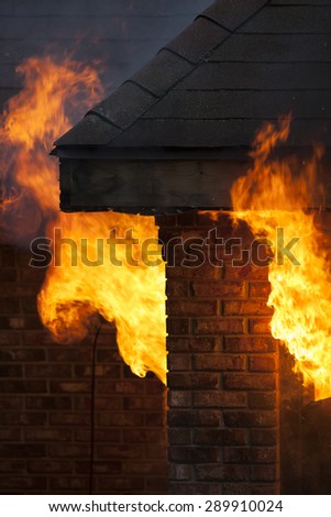 A residential house in flames during a fire disaster.