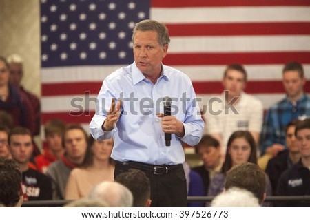 MADISON, WI/USA - March 28, 2016: Republican presidential candidate John Kasich speaks to a group of supporters during a town hall before the Wisconsin presidential primary in Madison, Wisconsin.