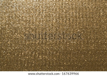 Gold metallic glitter fabric background