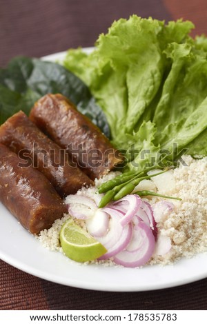 Thai Corn - Fish Salad ,Thai dish shredded fish mixed with slices of pork skin sausage