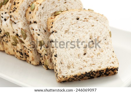 Sliced bread with pumpkin seeds and sesame,close up