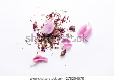 Dried rose and Rose petal for making rose tea on background