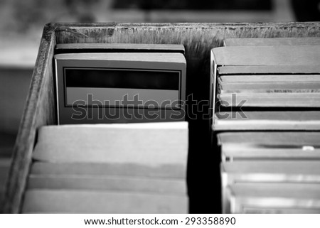 Books in wooden box,black and white