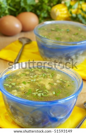 Corn soup with eggs and greens