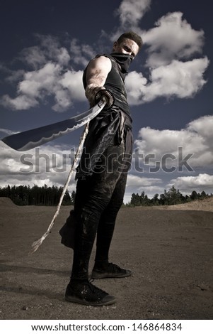 aggressive man with sword