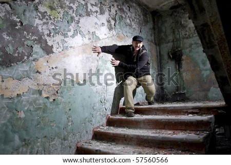 man in scary industrial place