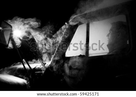 car in smoke