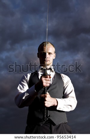 Man in suit with sword