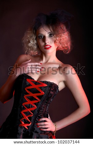 fashionable woman with art visage - Burlesque Dancer