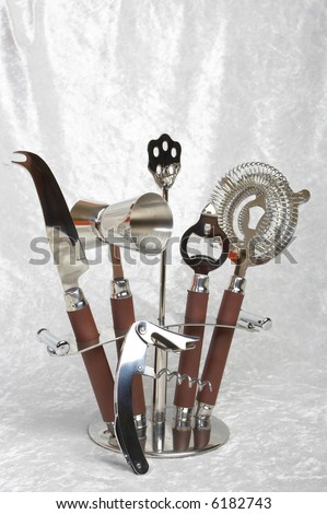 Bar Tool Set Includes: Stirring stick, Tools stand, Bar knife, Strainer, Cocktail Shaker, Double Jigger, Bottle opener