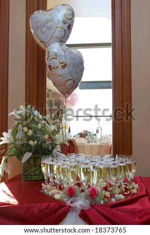 stock photo wedding table setting Champagne rose petals balloons