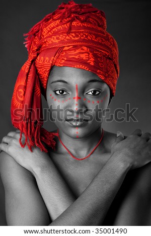  AfricanAmerican woman wearing a authentic tribal red orange head