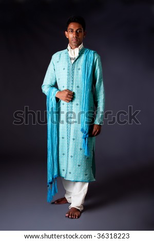 stock photo Beautiful authentic Indian hindu man in typical ethnic groom 