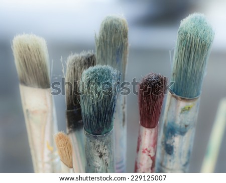 Group of artists paint brushes