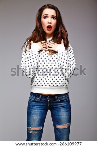 High fashion look.glamor stylish sexy surprised beautiful young woman model in summer bright jeans  hipster cloth