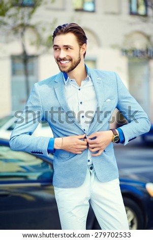Young stylish confident happy handsome businessman model  in suit cloth lifestyle in the street