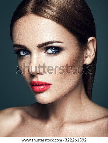 sensual portrait of beautiful  woman model lady with fresh daily makeup with red lips and clean healthy skin face