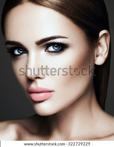 sensual portrait of beautiful  woman model lady with fresh daily makeup with nude lips color and clean healthy skin face