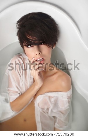 stock photo Sexy nude portrait of young pretty woman with short hair 