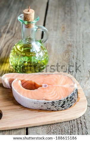 Food with unsaturated fats - salmon and olive oil