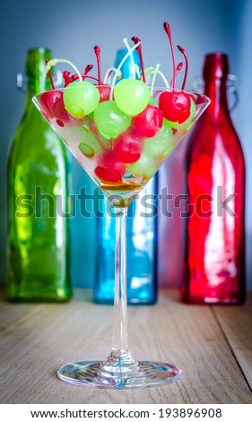 Glace cherries in martini glass
