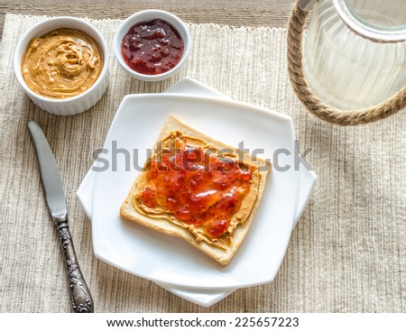 Sandwich with peanut butter and strawberry jelly