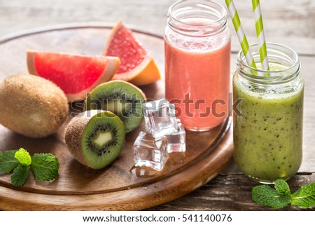 Glass jars of fruit  smoothies