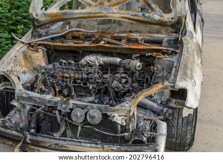 Burned out car after fire