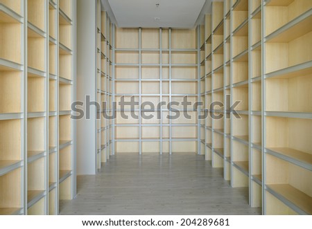 Empty wooden bookshelf