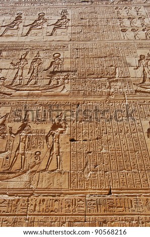 Reliefs of Egyptian hieroglyphs on wall at Edfu Temple, Egypt