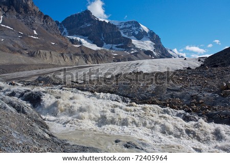 Athabasca glacier with melt water in Jasper National Park
