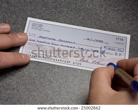 A mortgage payment check. The check is entirely original artwork and the routing number is deliberately too short.