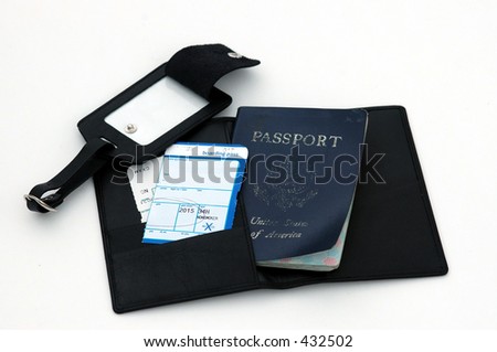 travel documents including passport, boarding pass, baggage tag and folder