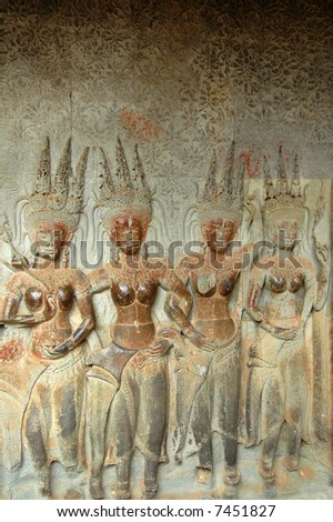 Wall engravings/relief of temple devi dancers at Angkor wat in Cambodia