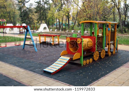 climbing frame in the shape of a train shallow DOF