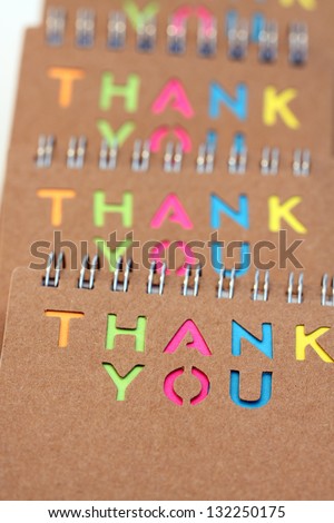 Notebook with the words thank you cut the cover. Recycle notebook concept