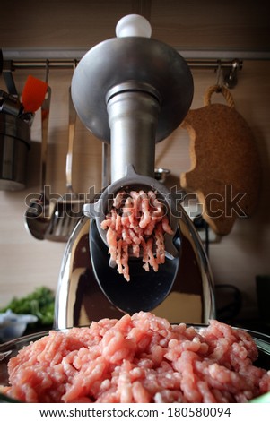 Meat grinder close up, preparation of forcemeat