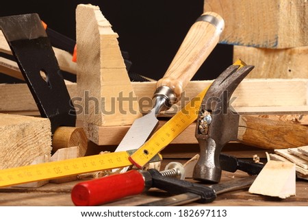 carpenter\'s tools close up on work bench