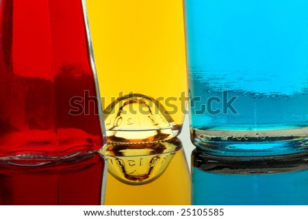different in shape bottles fill with color liquids