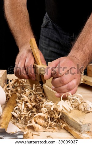 carpenter's hands - working with plane