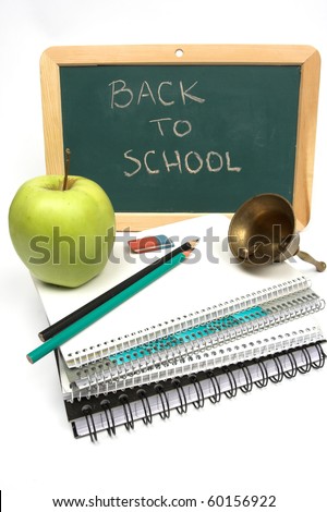 back to school concept- notebooks, apple dnd scool-bell