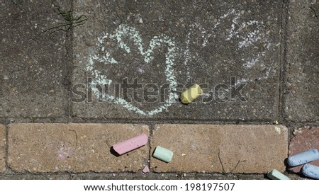 Child\'s Chalk Drawing on a sidewalk
